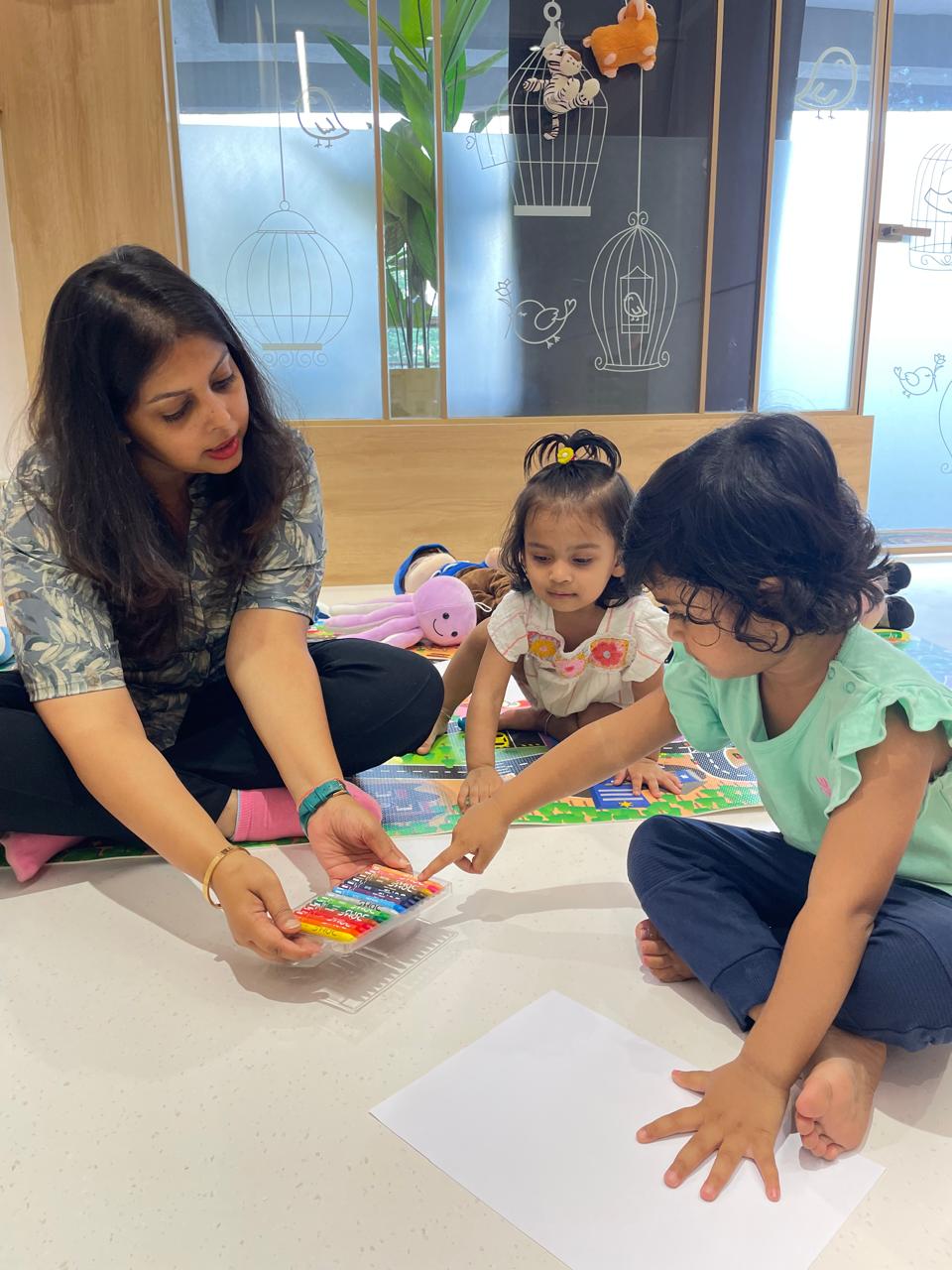 Children learning through play with building blocks at K K Wagh Cubs